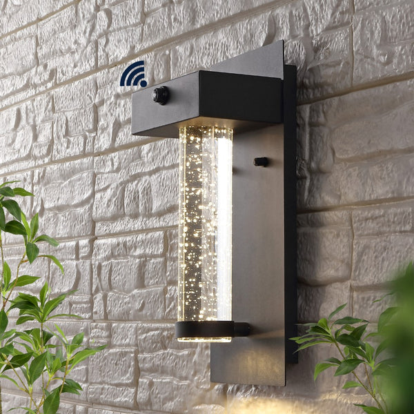 Edgeo 5.5" Minimalist Industrial Iron/Glass Seeded Glass with Dusk-to-Dawn Sensor Integrated LED Outdoor Sconce